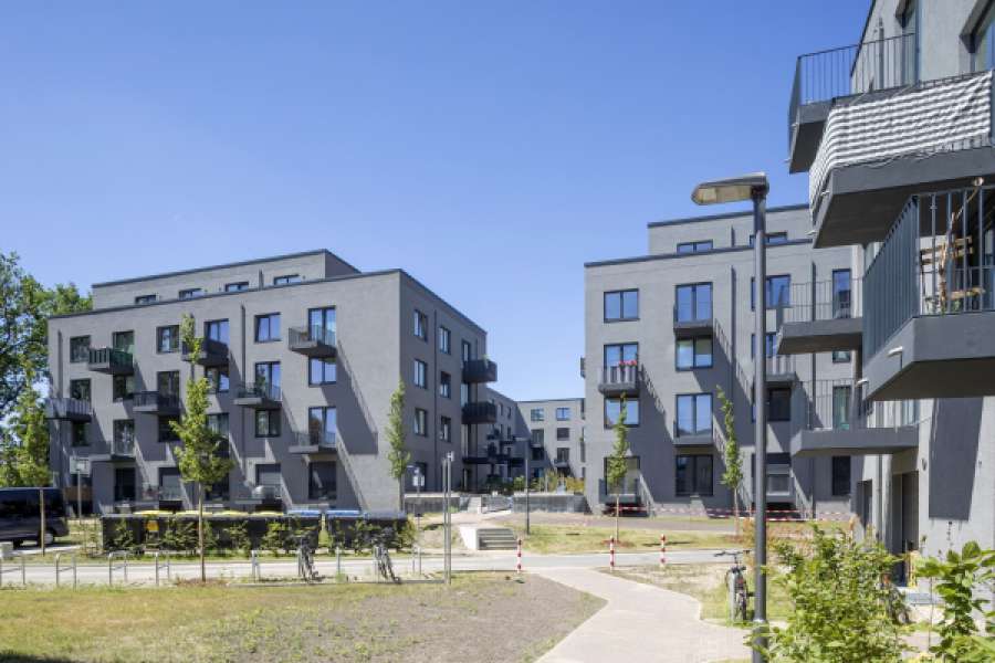 Die Howoge baute in Berlin-Lichtenberg aus sieben Wohnhäusern in drei Themenhöfen. FOTO: HOWOGE/Dombrowsky