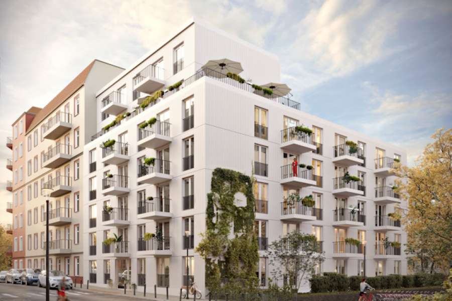 In unmittelbarer Nähe zum großen innerstädtischen Park Friedrichshain entsteht dieses Mehrfamilienhaus von der WBM Wohnungsbaugesellschaft Berlin-Mitte. Rendring: C. Lechner Development